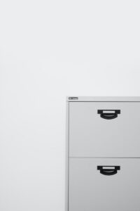 gray metal locker on white surface
